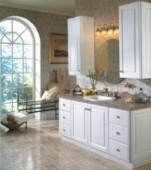 Remodeled white kitchen with arched window