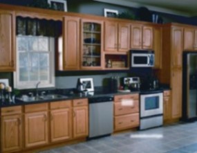 Remodeled oak kitchen with stainless steel appliances