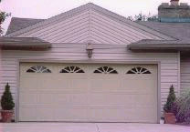 Garage with custom arched decorative window trim